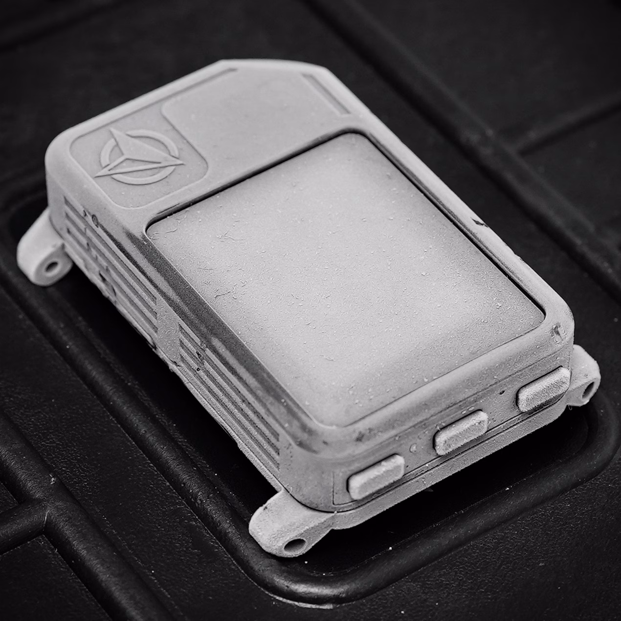 Frost-covered Stratos altimeter showing its three side buttons